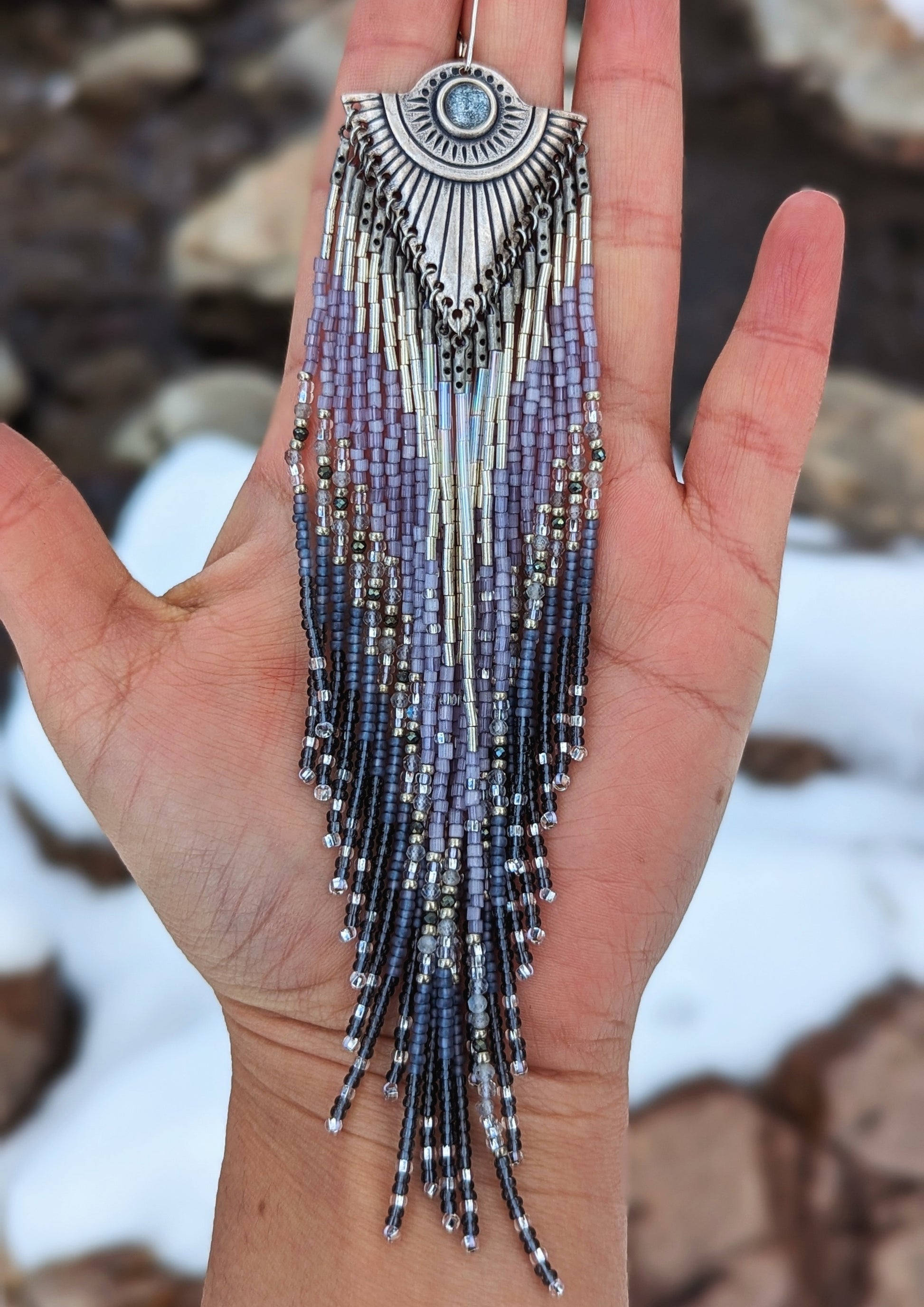 Handcrafted beaded earrings by Moon & Milk inspired by Tlaloc, featuring silver hues, labradorite, pyrite stones, topaz cabochons, and sterling silver leverbacks.