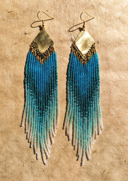 Long ombré blue and seafoam green beaded earrings by Moon & Milk, handmade with brass findings and inspired by Greek naiads and freshwater mysticism