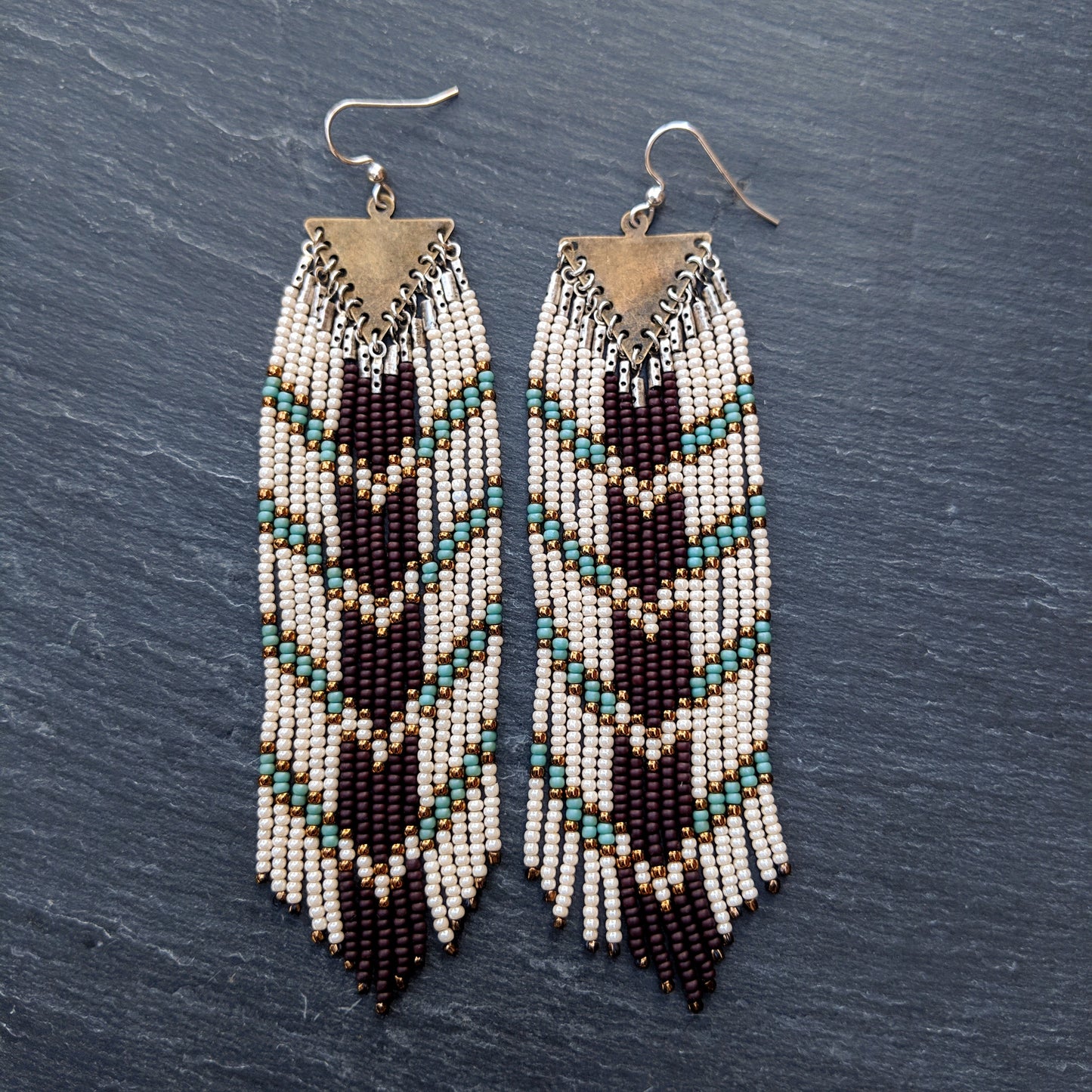 Long boho seed bead earrings with a chocolate brown and blue chevron design perfect for your bohemian wedding party.