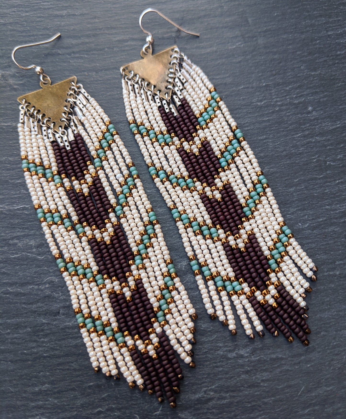 Long boho seed bead earrings with a chocolate brown and blue chevron design perfect for your bohemian wedding party.