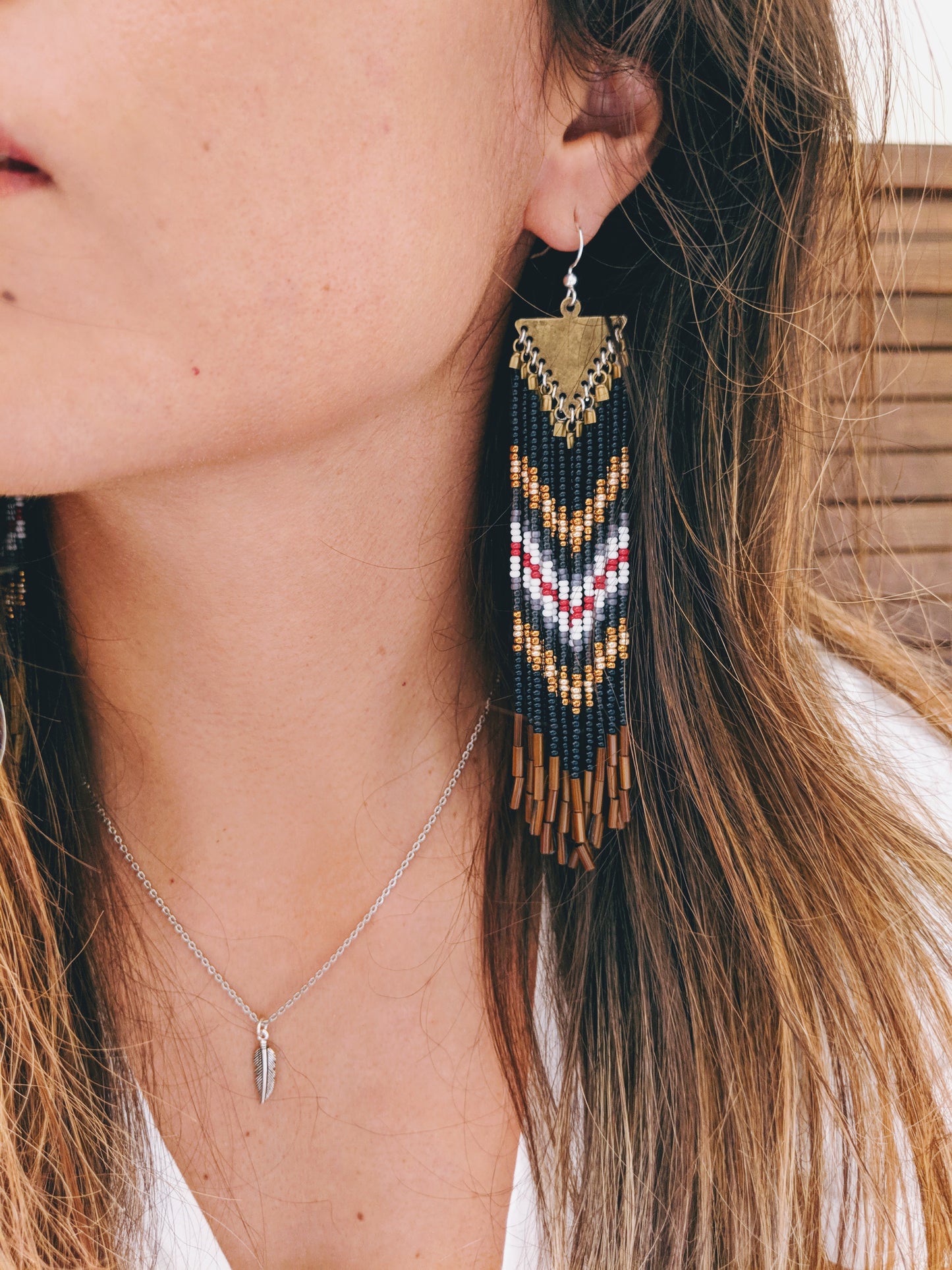 Moon & Milk - Native American style fringe earrings with a red, white, and blue chevron design.