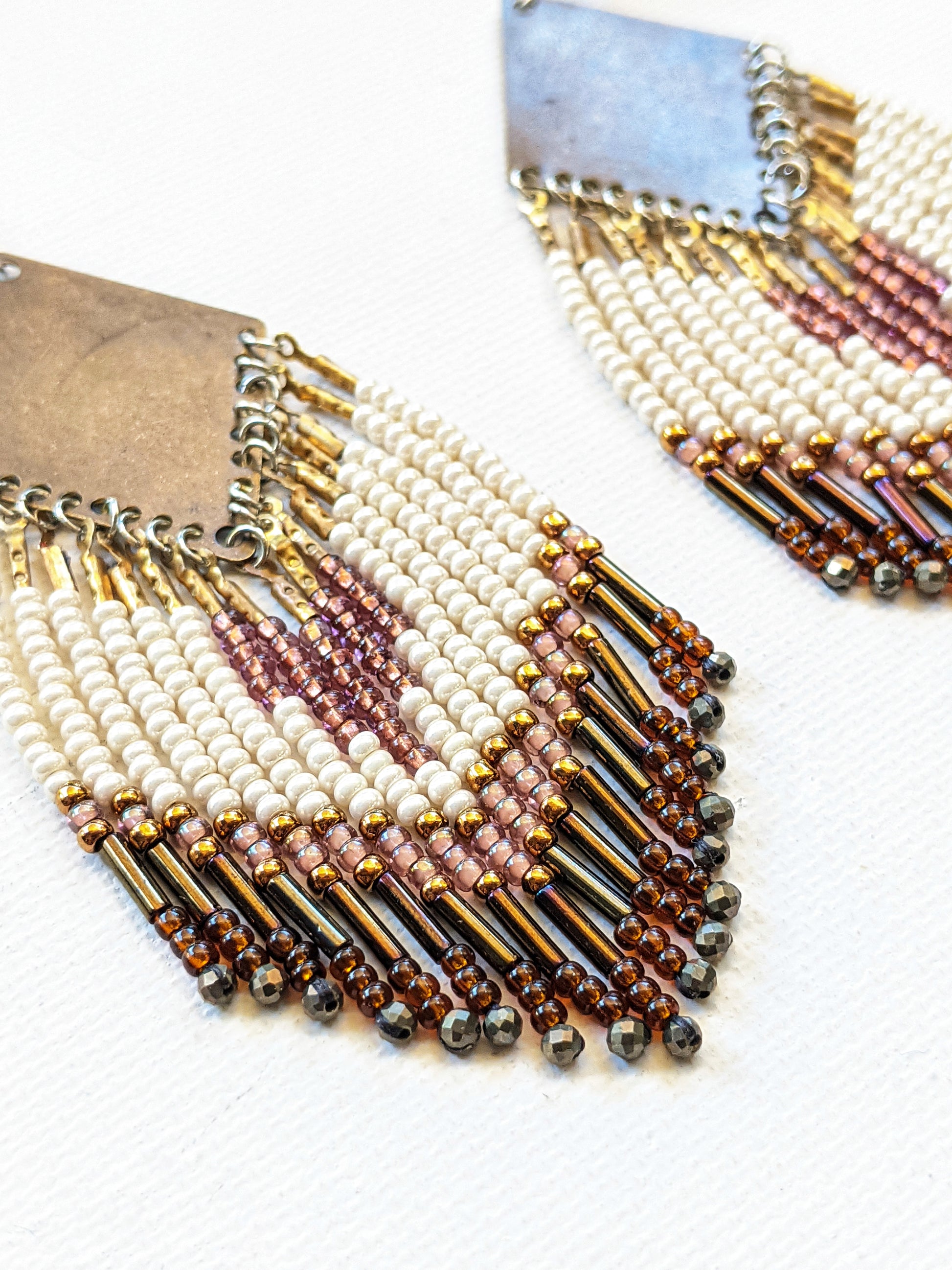 Moon & Milk - Handmade beaded fringe earrings created with pyrite stones, glass seed beads, brass, and sterling silver.