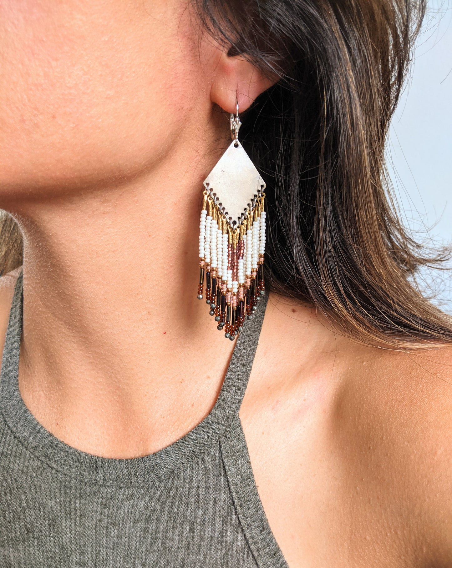 Moon & Milk - Handmade beaded fringe earrings created with pyrite stones, glass seed beads, brass, and sterling silver.