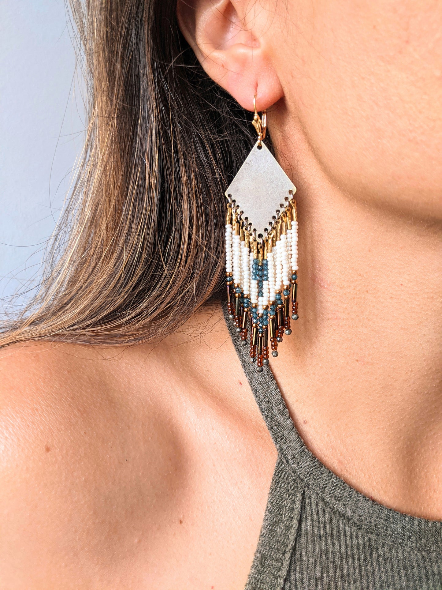 Moon & Milk - Handmade beaded fringe earrings created with pyrite stones, blue topaz, glass beads, brass, and sterling silver.