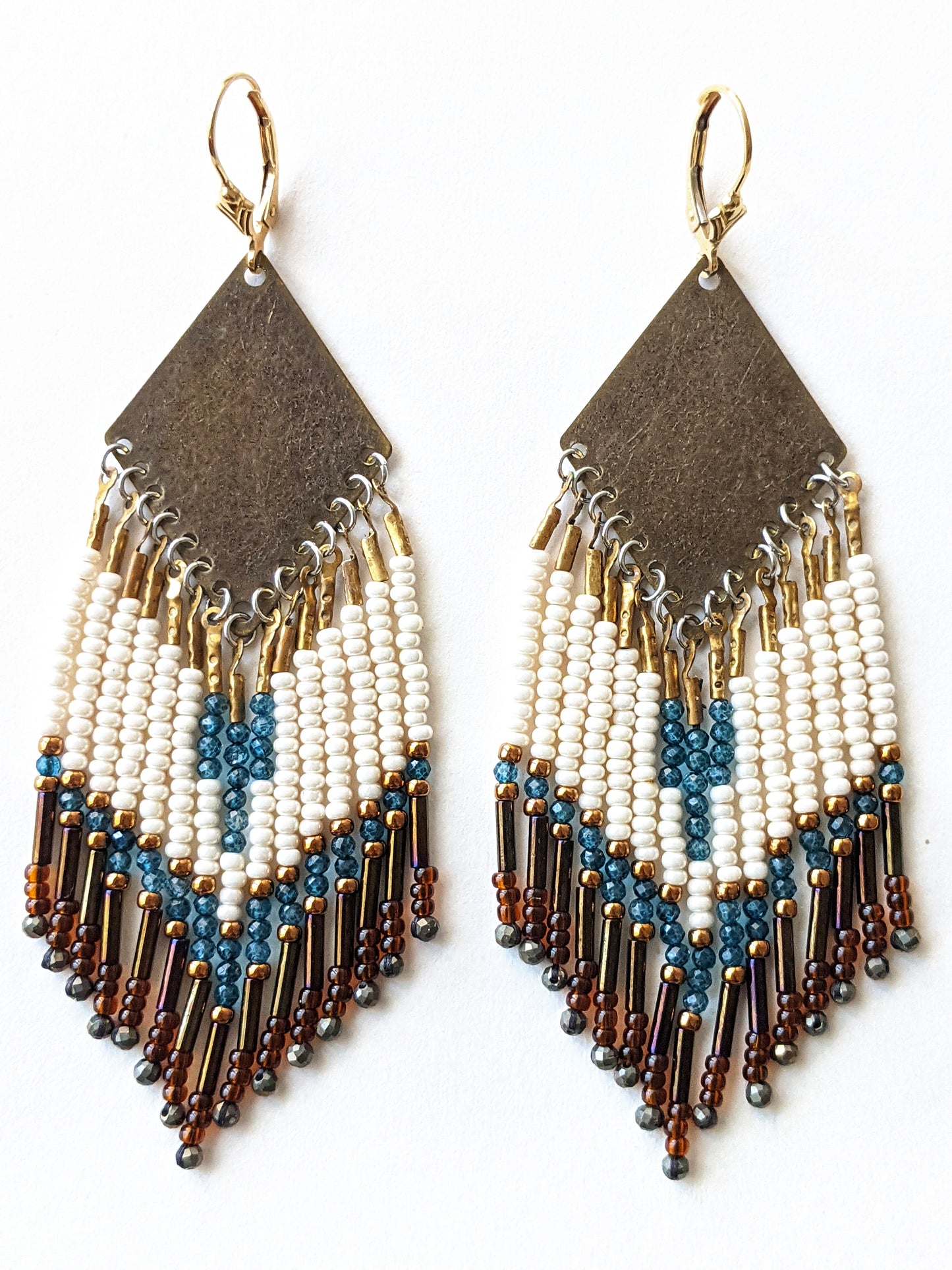 Moon & Milk - Handmade beaded fringe earrings created with pyrite stones, blue topaz, glass beads, brass, and sterling silver.