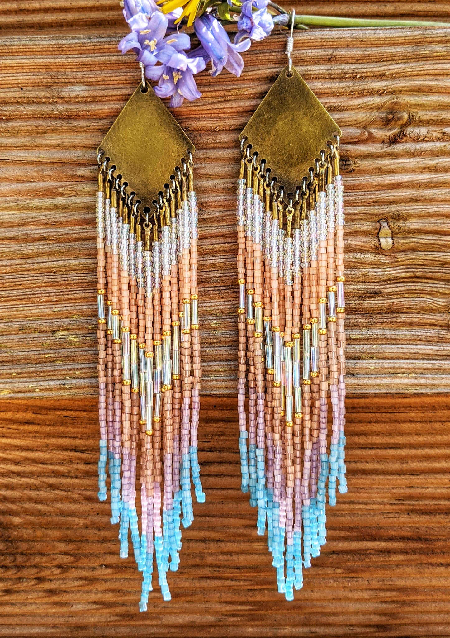 Moon & Milk artisan earrings handcrafted with satin hex-cut beads, brass, and sterling silver. Soft pastel beadwork in a long native earring design.