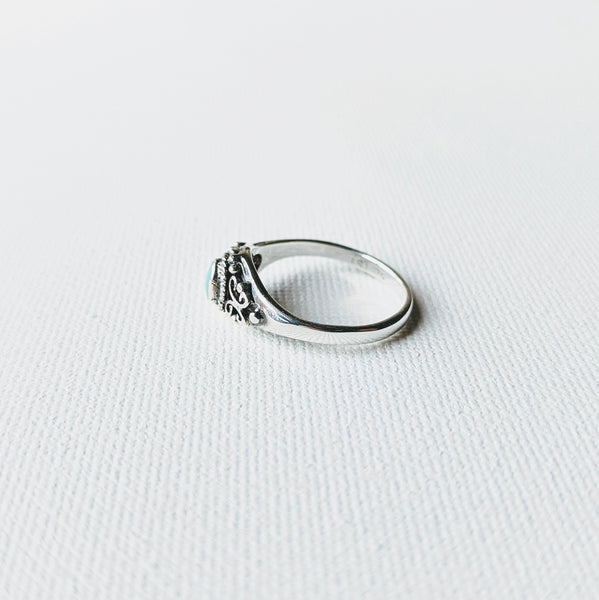 Moon & Milk -925 sterling silver ring with a small turquoise stone and filigree vine design