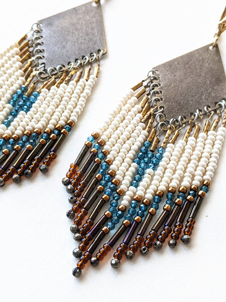 Moon & Milk - Handmade beaded fringe earrings created with pyrite stones, blue topaz, glass beads, brass, and sterling silver.