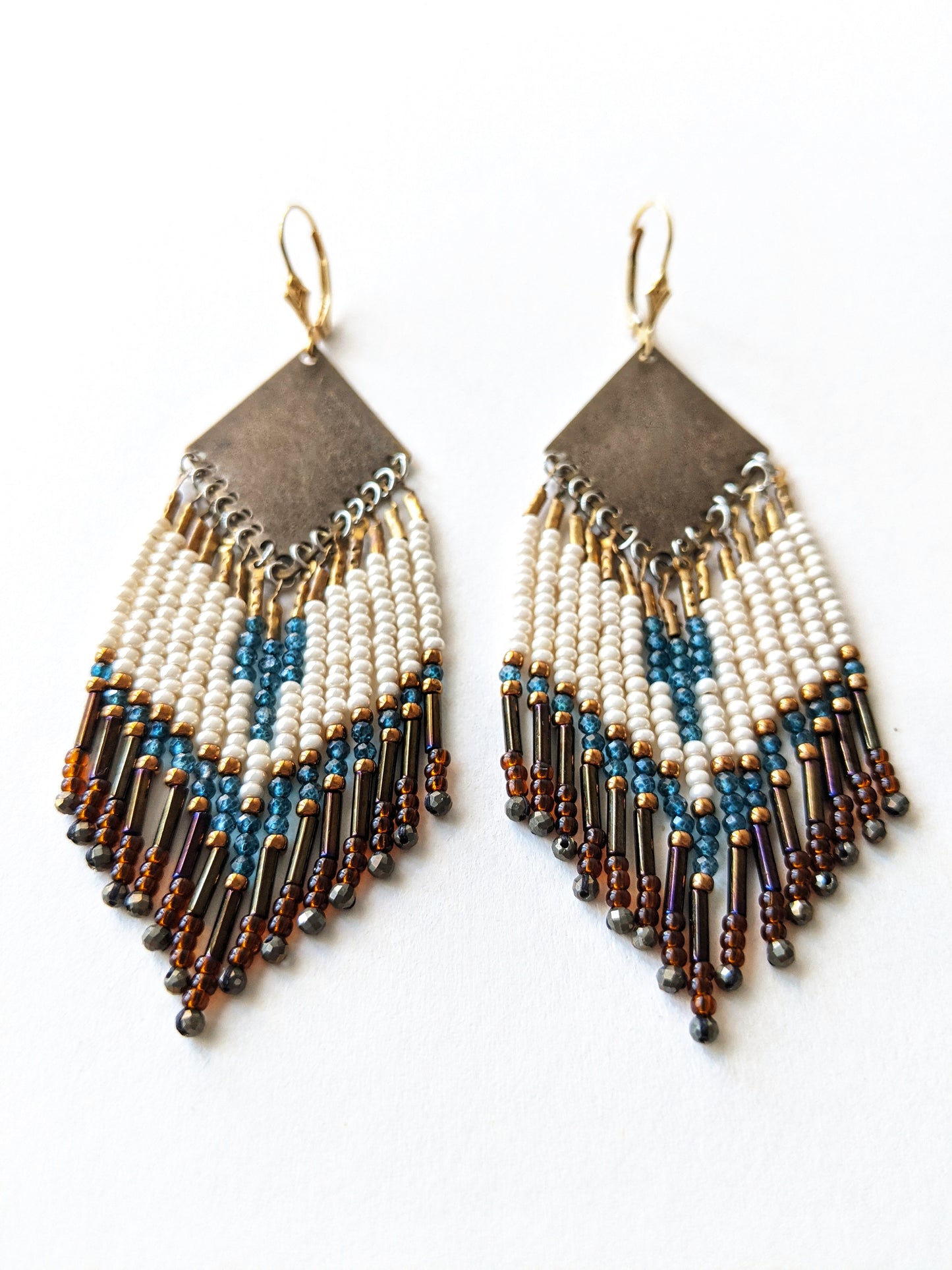 Moon & Milk - Handmade beaded fringe earrings created with pyrite stones, blue topaz, glass beads, brass, and sterling silver.