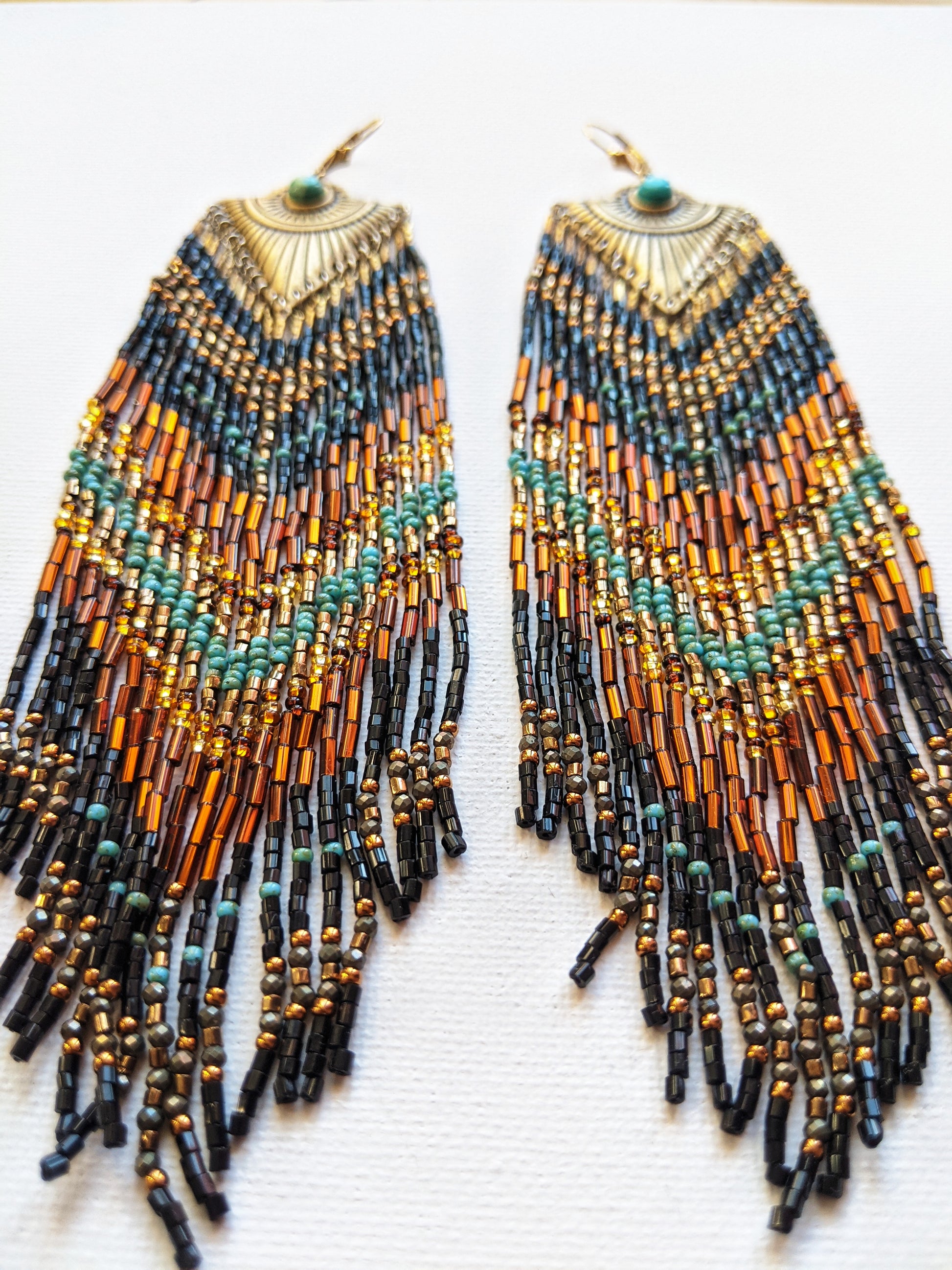 Moon & Milk - Handmade beaded tribal earrings created with semi-precious stones such as turquoise and pyrite, glass seed beads, and gold-filled ear wires.