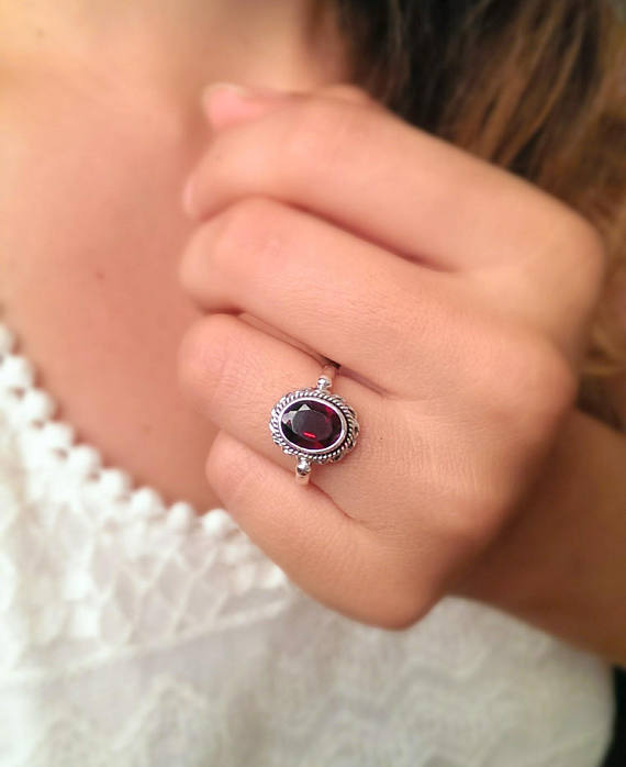 Moon & Milk - 925 sterling silver oval garnet ring with two delicate twisted rope designs around the frame
